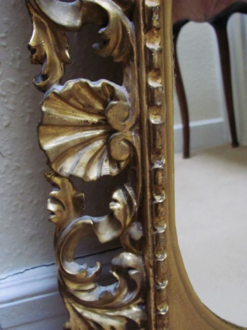 19TH CENTURY CARVED GILT WOOD FLORENTINE FRAMED OVAL WALL MIRROR - ADDITIONAL PHOTO 2
