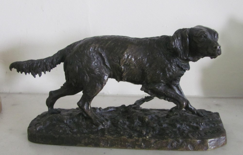 A 19th-century dark patinated bronze sculpture depicting a setter dog on a naturalistic base, bearing an incised signature P.J. MENE. View V