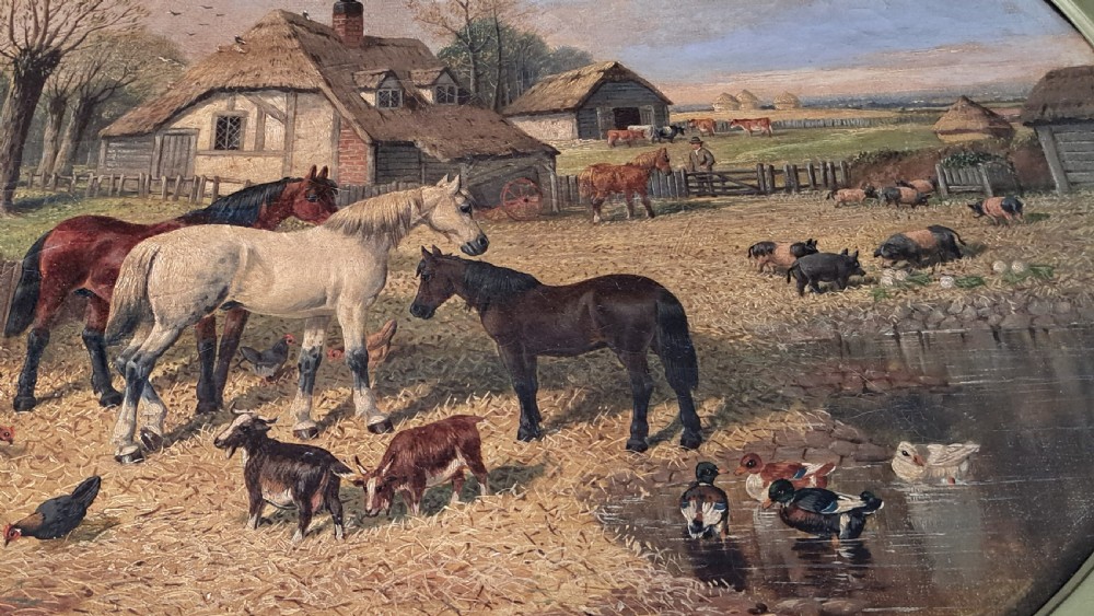 A 19th-century oil painting depicting horses and farmyard animals in a circular aperture, enclosed within a large square carved gilt frame. View III