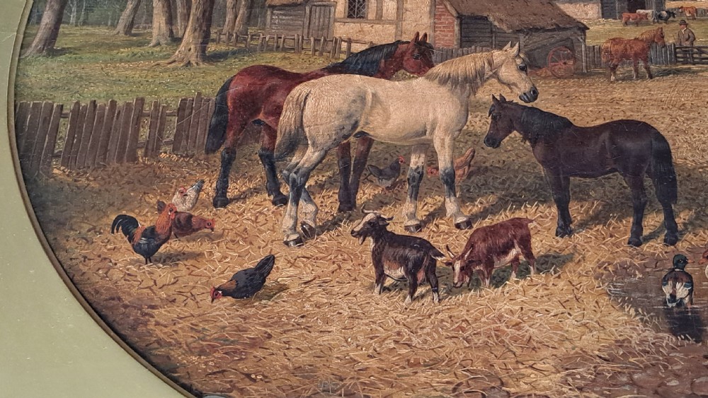 A 19th-century oil painting depicting horses and farmyard animals in a circular aperture, enclosed within a large square carved gilt frame. View VI