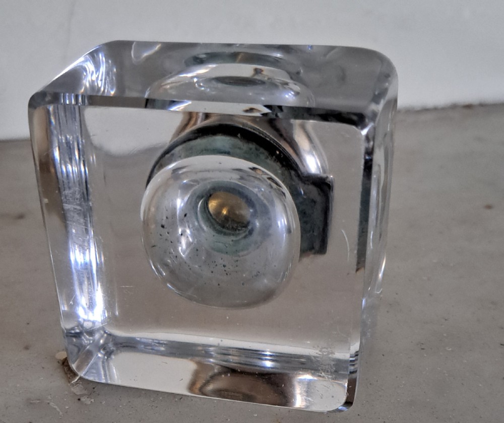 A square clear glass inkwell featuring a hinged silver dome lid with a gilded interior mechanism. View XII
