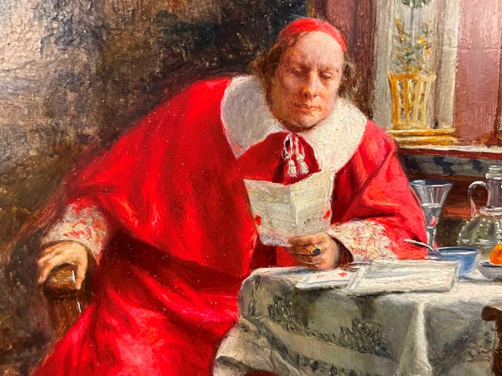 An antique oil painting depicting a cardinal in red robes seated at a table beside a leaded glass window, set within an ornate gilded frame. View V