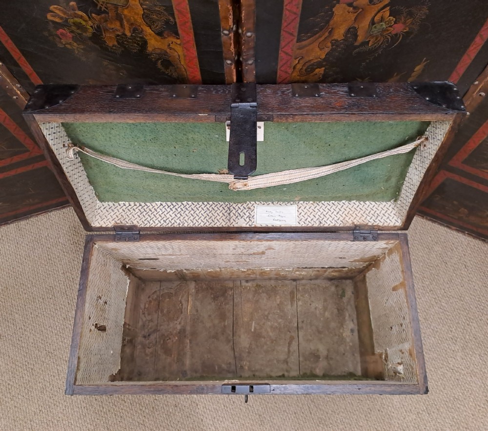 A dark Georgian oak silver chest bound with heavy iron strapwork and featuring an engraved metal nameplate on the front panel. View XVI