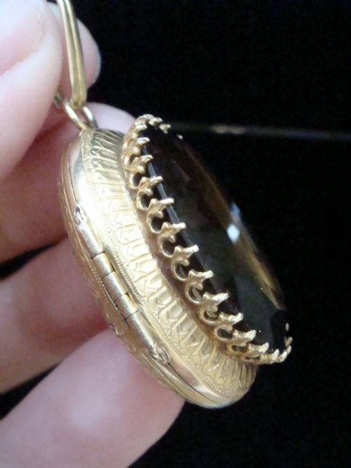 fig 1. Victorian 18ct yellow gold locket pendant set with a large faceted oval brown citrine gemstone.