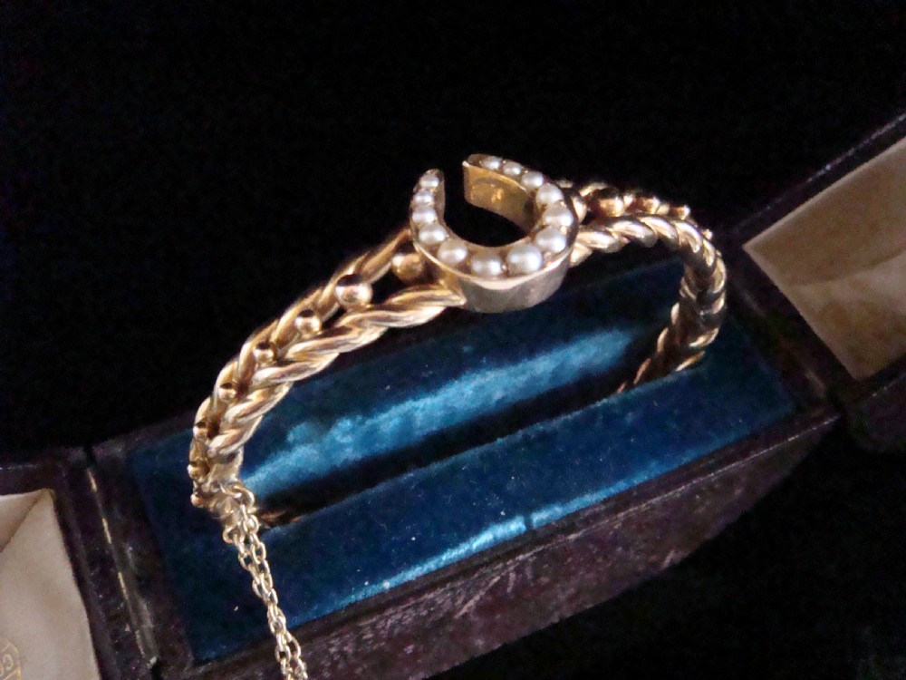 Victorian 15ct yellow gold seed pearl horseshoe bangle 15.2g in original fitted case