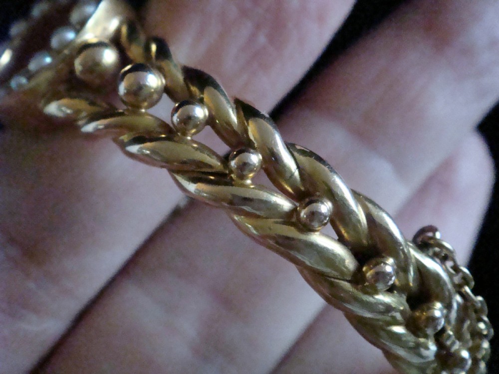 Victorian 15ct yellow gold seed pearl horseshoe bangle 15.2g in original fitted case View V