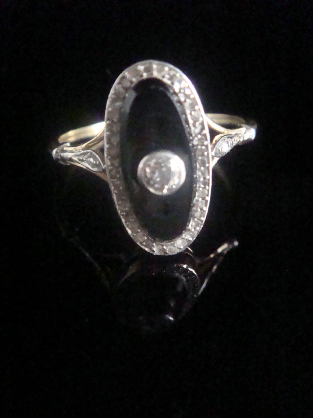 FRENCH EDWARDIAN 18CT PLATINUM ONYX AND ROSE CUT DIAMOND OVAL RING