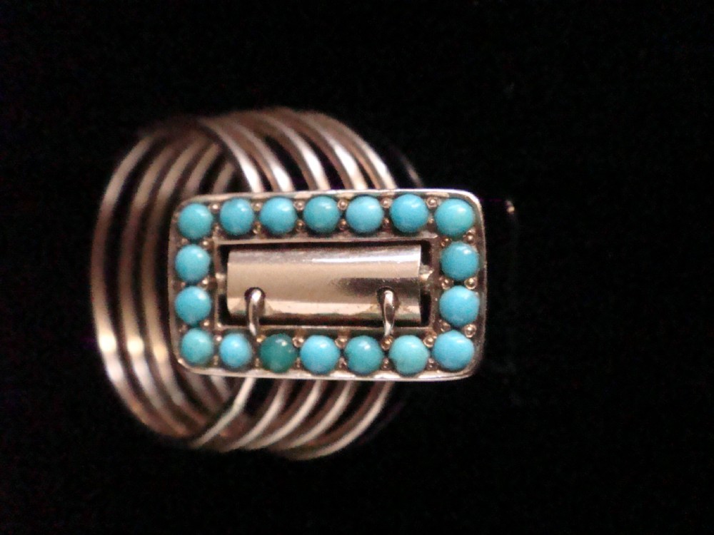 A Victorian 18ct rose gold five-row harem ring featuring a central rectangular buckle motif set with circular turquoise cabochons. View III