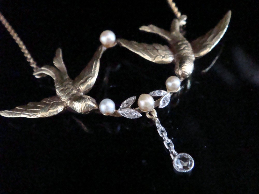Edwardian 18ct yellow gold rose cut diamond natural pearl swallow necklace