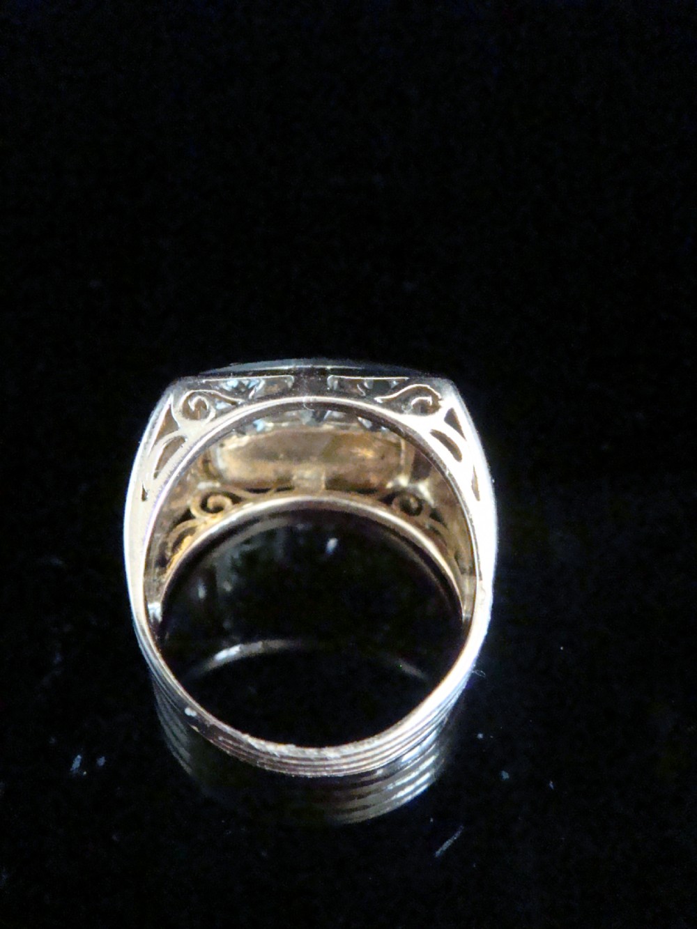 An 18ct yellow gold tank ring featuring a rectangular platinum panel set with bright diamonds. View III