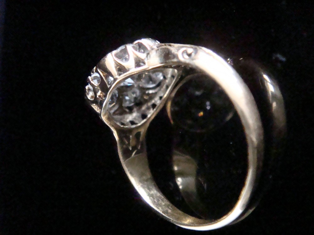 Victorian 18ct yellow gold ring featuring a multi-diamond cluster head and ornate scrollwork shoulders. View III