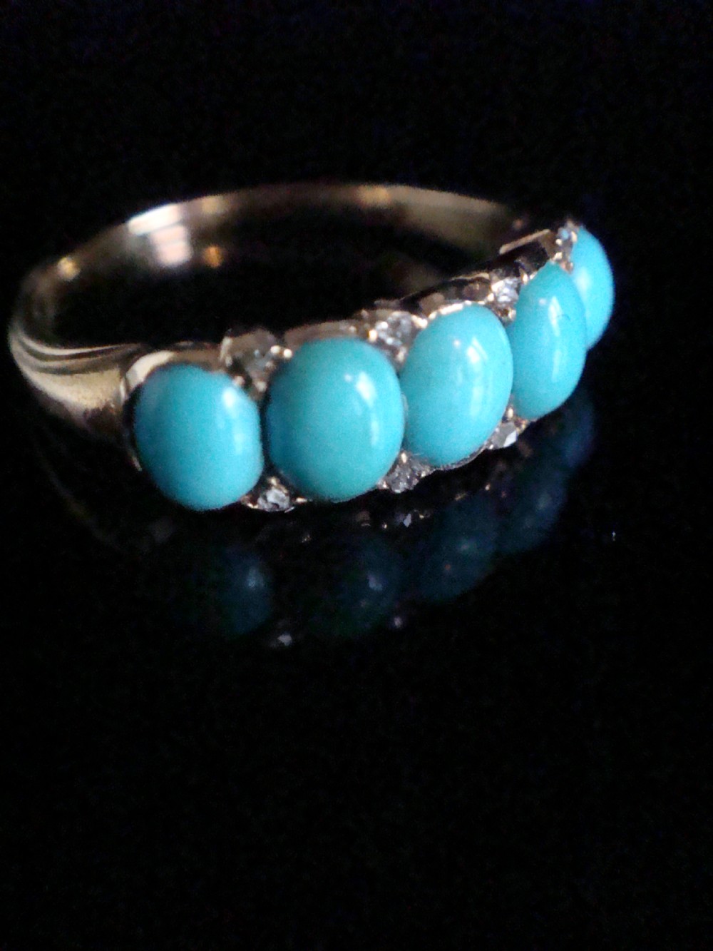 Victorian 18ct yellow gold five-stone ring set with vibrant turquoise cabochons and diamond accents. View II