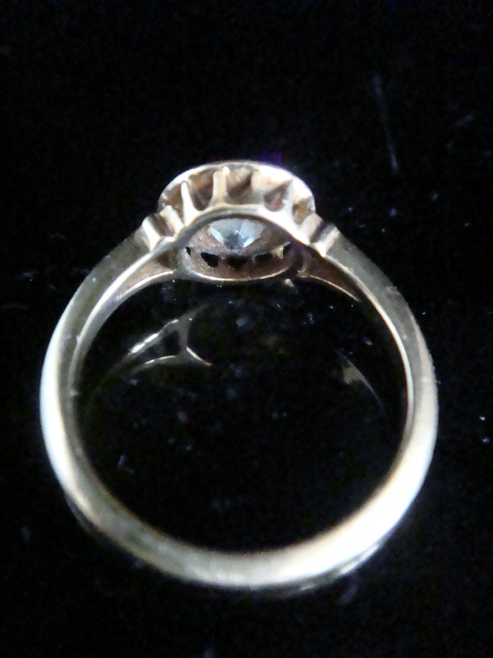 An 18ct yellow gold Victorian ring featuring a central starburst engraving with a single flush-set diamond. View II