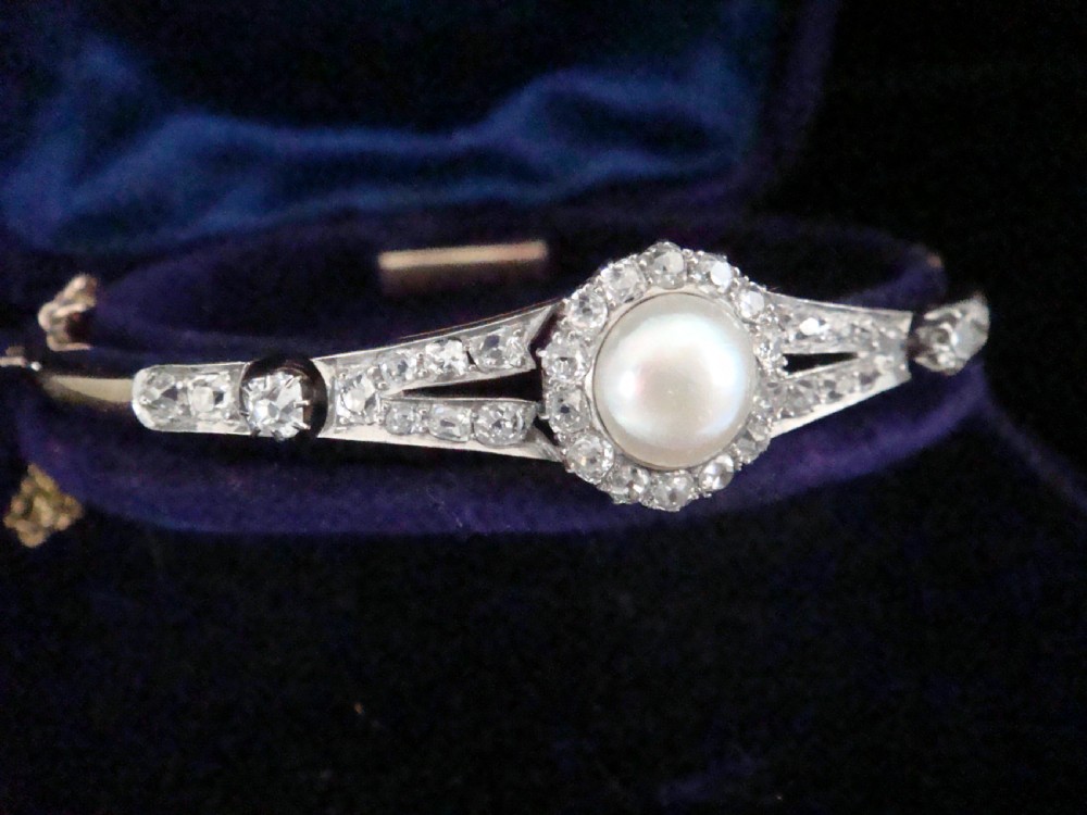EDWARDIAN 18CT PLATINUM NATURAL SALTWATER PEARL AND DIAMOND BANGLE BRACELET View II