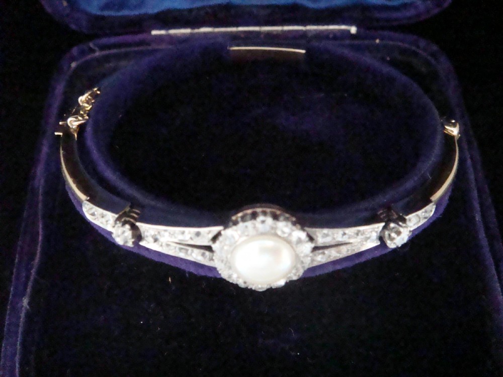 EDWARDIAN 18CT PLATINUM NATURAL SALTWATER PEARL AND DIAMOND BANGLE BRACELET View III