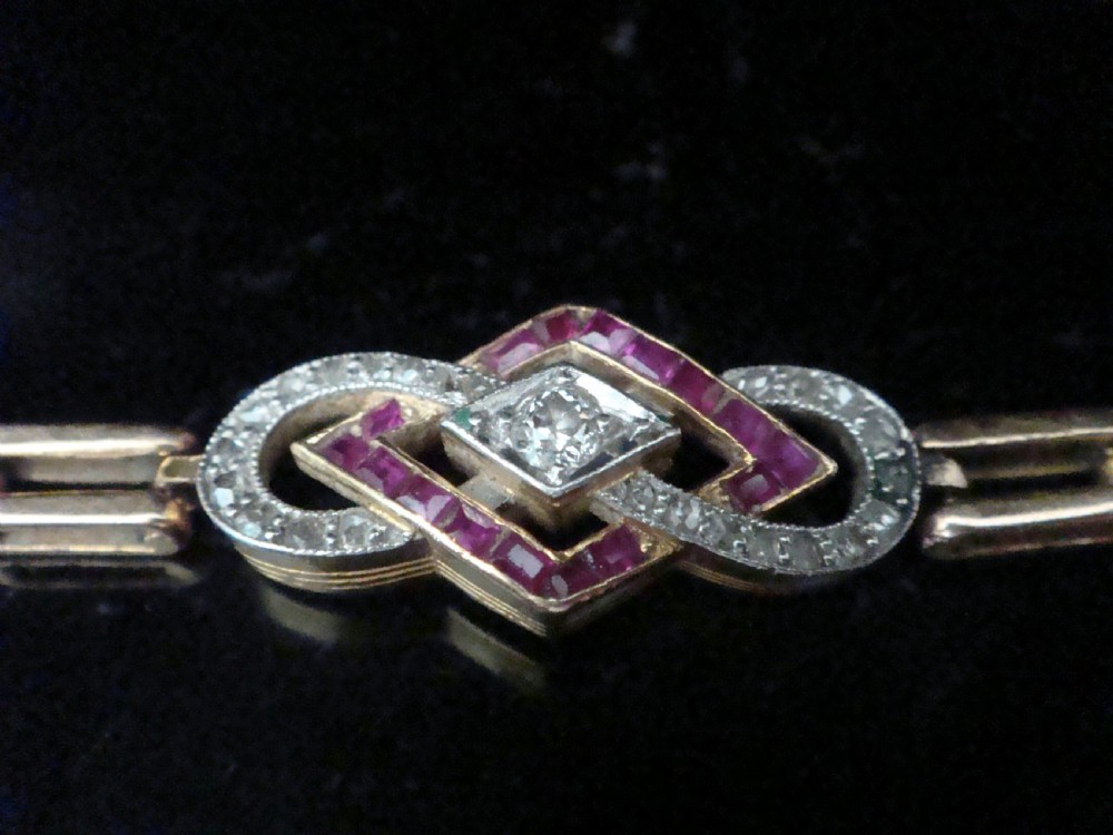 FRENCH EDWARDIAN 18CT RUBY AND DIAMOND BRACELET View V