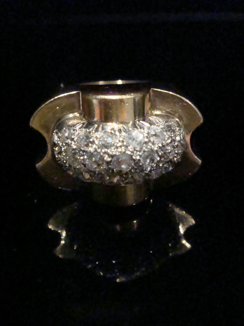 A French Retro Tank ring crafted in gold and platinum with a central pave-set diamond cluster. View II