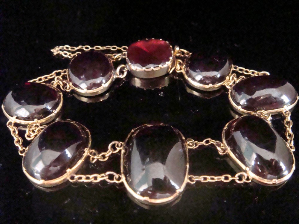 Edwardian 9ct large cabochon garnet bracelet with concealed garnet clasp