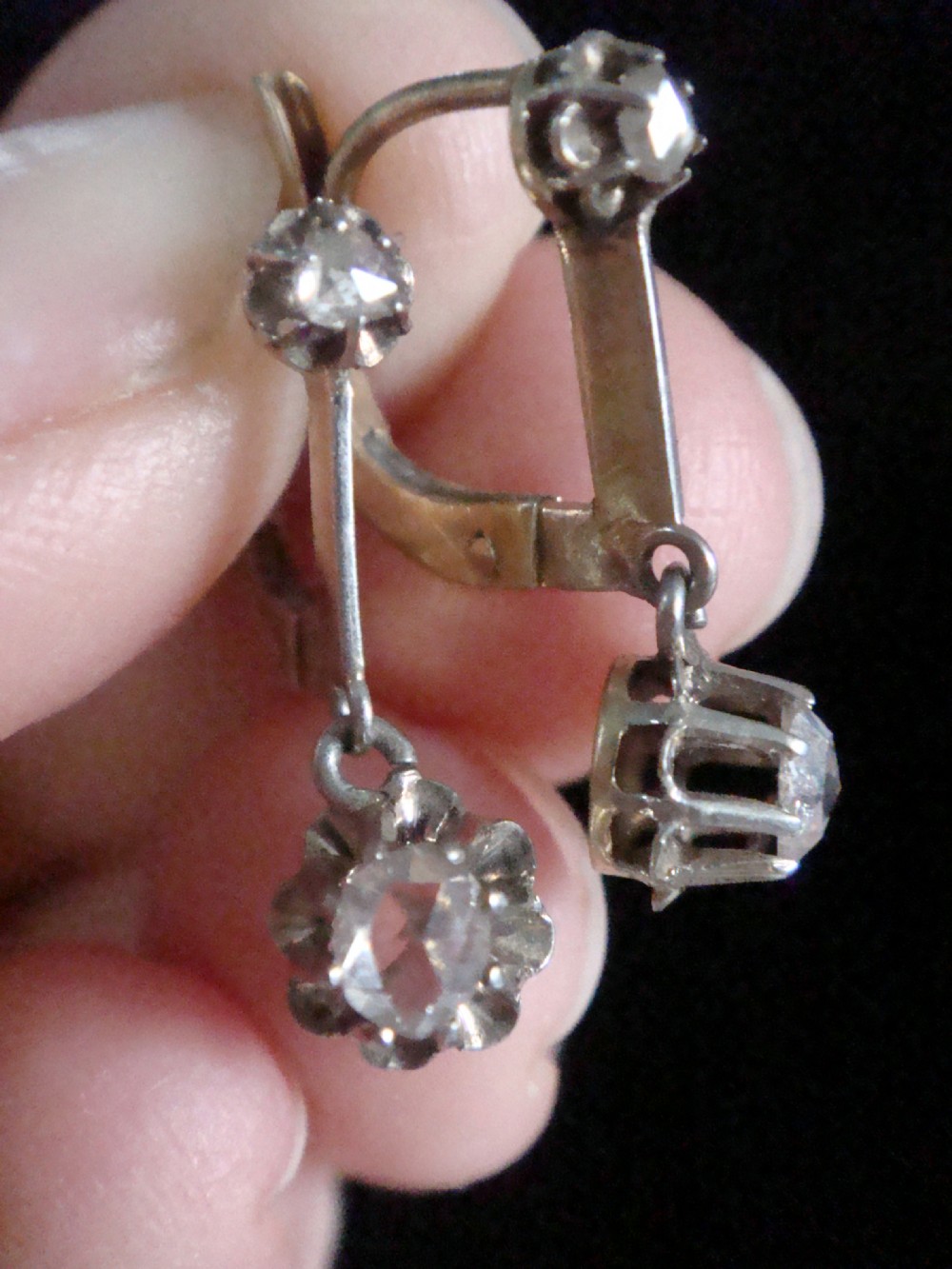Pair of Edwardian 18ct yellow gold drop earrings featuring rose cut and old cut diamond settings with leverback fittings. View III