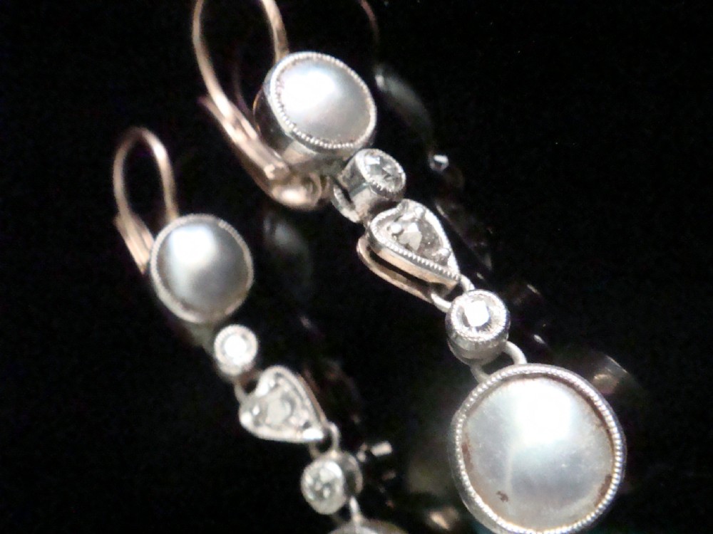A pair of Edwardian rose gold drop earrings set with grey pearls and rose-cut diamonds, featuring a heart-shaped motif. View II