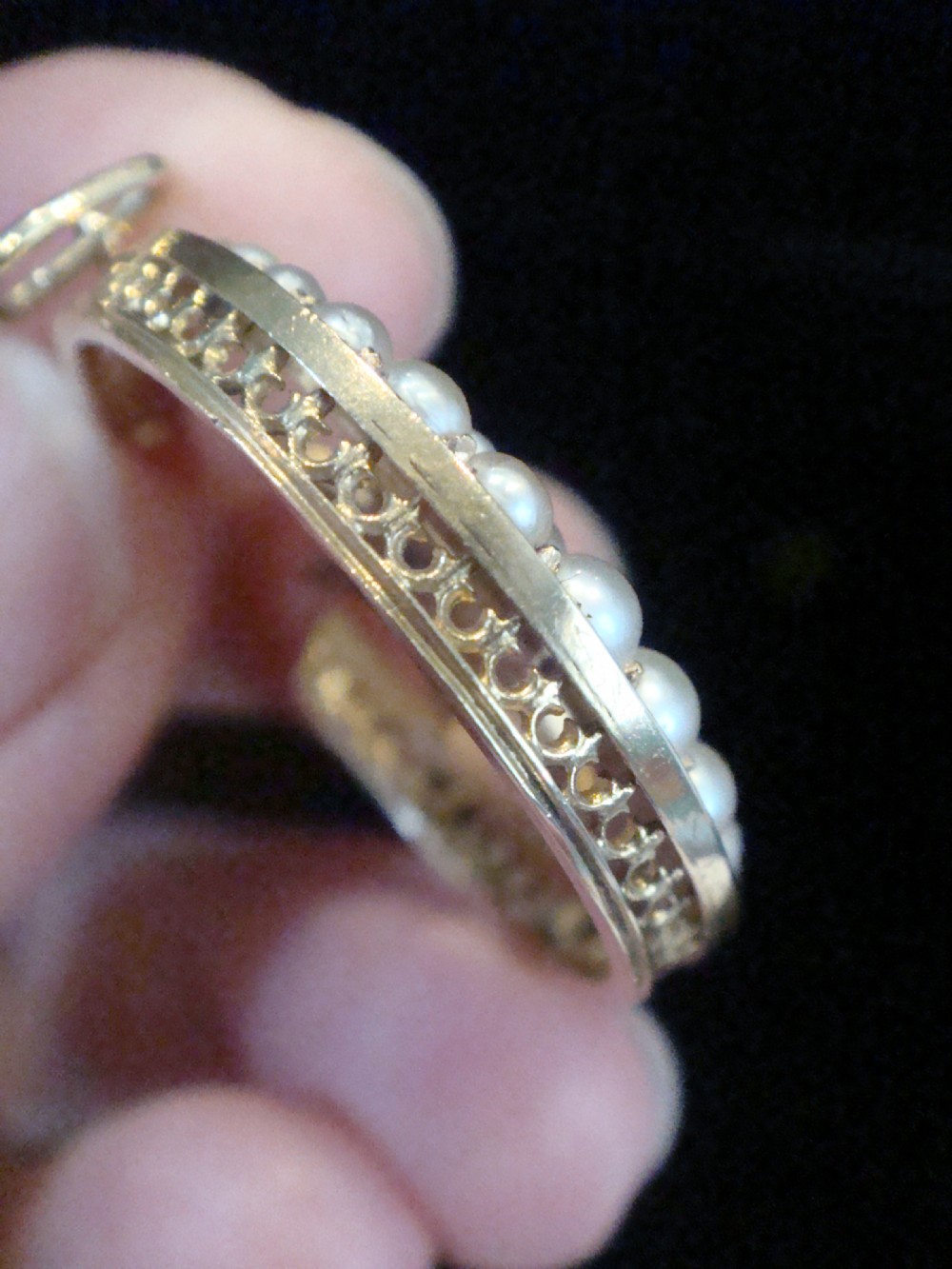 Victorian 15ct yellow gold crescent moon pendant set with split seed pearls, enclosing a central six-pointed star with a blue sapphire. View II