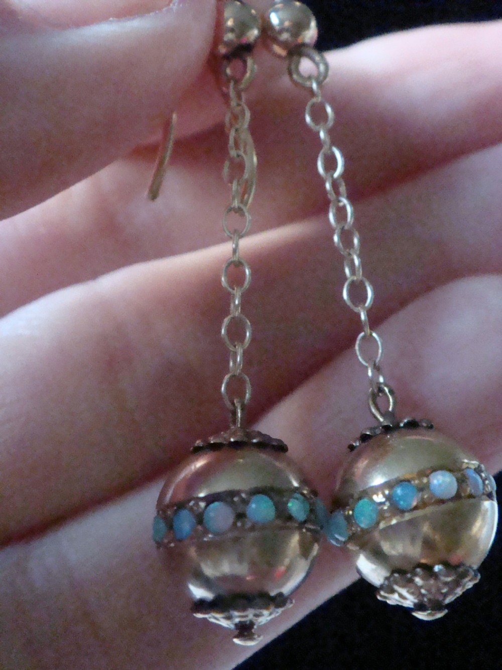 Pair of Edwardian 15ct yellow gold drop earrings with spherical pendants decorated with a central band of round natural opals. View V