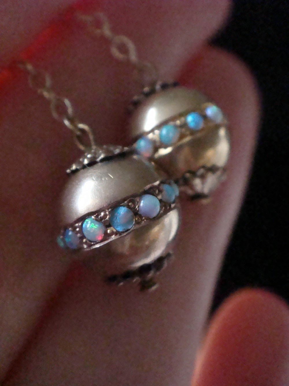 Pair of Edwardian 15ct yellow gold drop earrings with spherical pendants decorated with a central band of round natural opals. View VII
