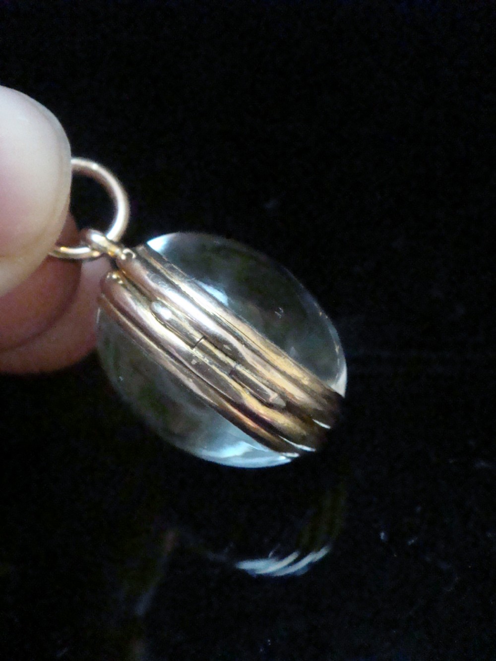 Edwardian 9ct rolled gold heavy thick rounded pools of light crystal locket View III