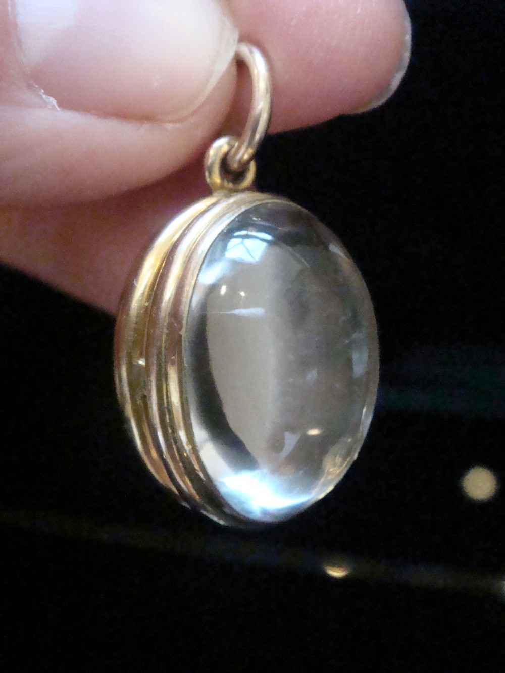 Edwardian 9ct rolled gold heavy thick rounded pools of light crystal locket View IX