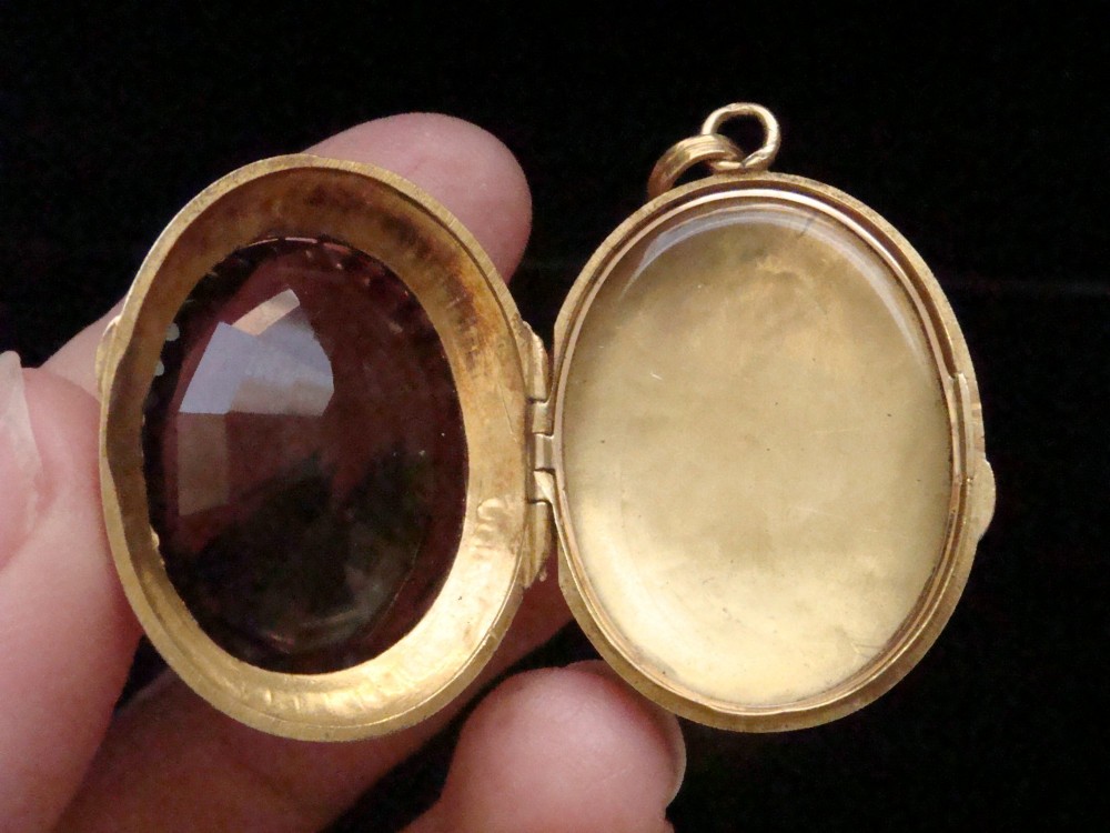Victorian 18ct yellow gold locket pendant set with a large faceted oval brown citrine gemstone. View VII