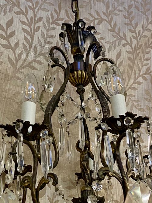 A FIVE LIGHT ITALIAN DARK FRAMED CHERUB ANTIQUE CHANDELIER - ADDITIONAL PHOTO 1