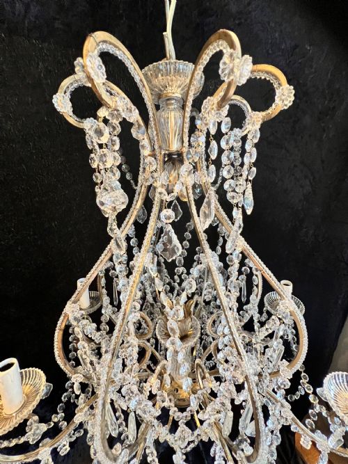 A PAIR OF EIGHT LIGHT FLORENTINE ANTIQUE CHANDELIERS - ADDITIONAL PHOTO 3