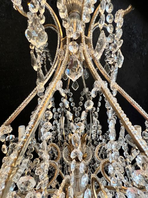 A PAIR OF EIGHT LIGHT FLORENTINE ANTIQUE CHANDELIERS - ADDITIONAL PHOTO 4
