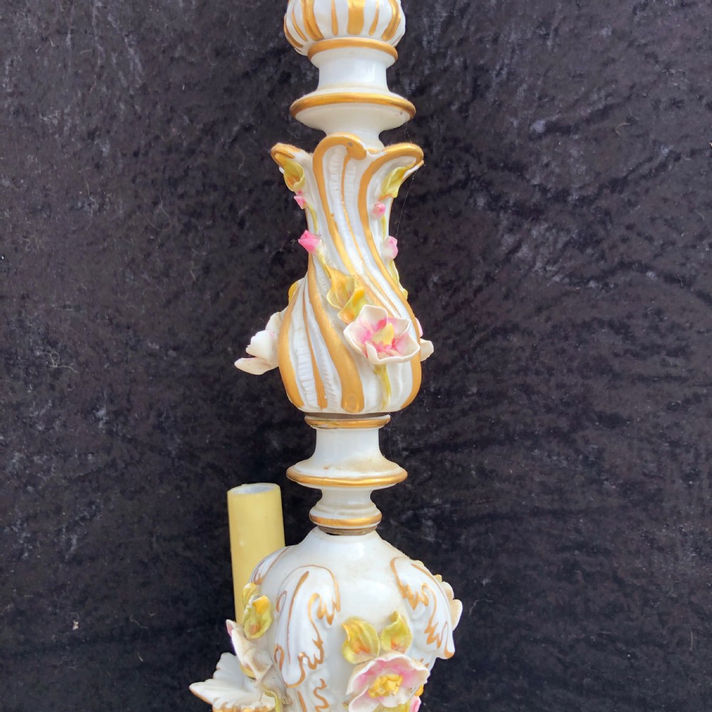 A three-arm Capodimonte porcelain chandelier with white glaze, gold scroll detailing, applied ceramic flowers, and candle-style bulb holders. View III