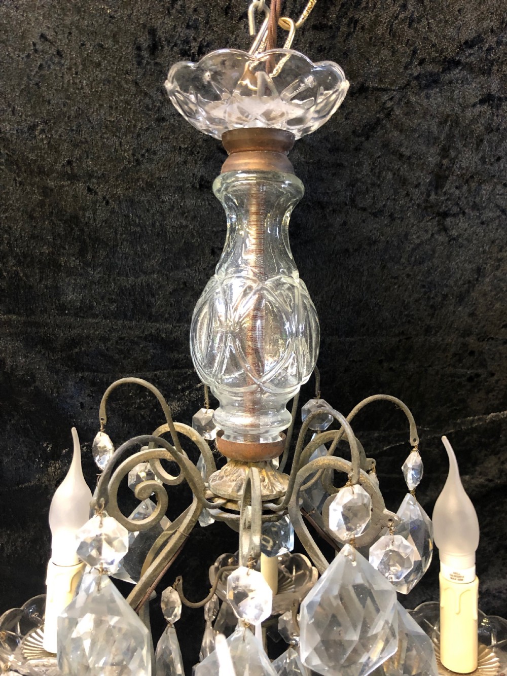 A nine-light French cage-style chandelier featuring a dark patinated metal frame decorated with cut glass crystal drops and a central blown glass stem. View II