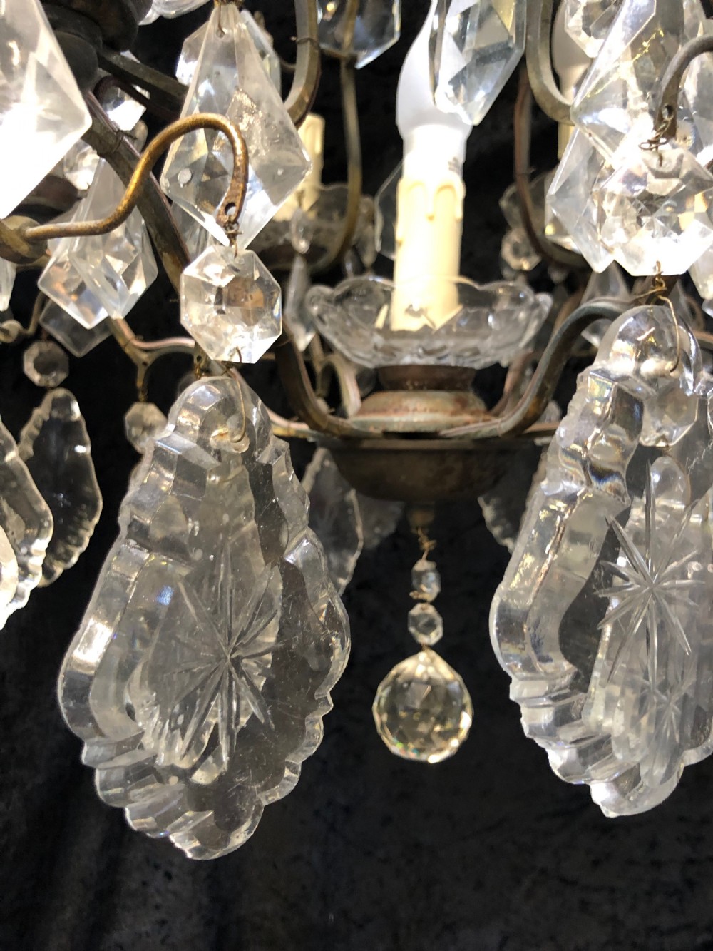 A nine-light French cage-style chandelier featuring a dark patinated metal frame decorated with cut glass crystal drops and a central blown glass stem. View VI