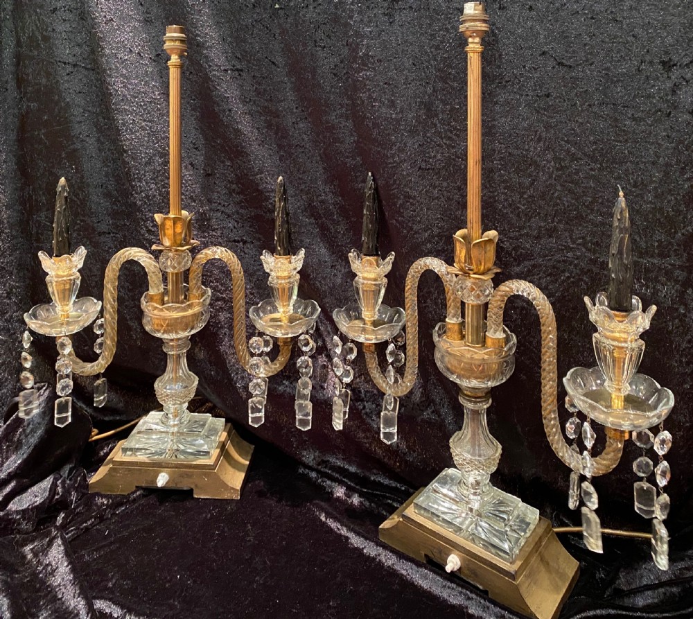 A pair of gilt brass and cut crystal two-arm candelabra table lamps featuring twisted glass arms, cascading crystal droplets, and stepped bases. View II