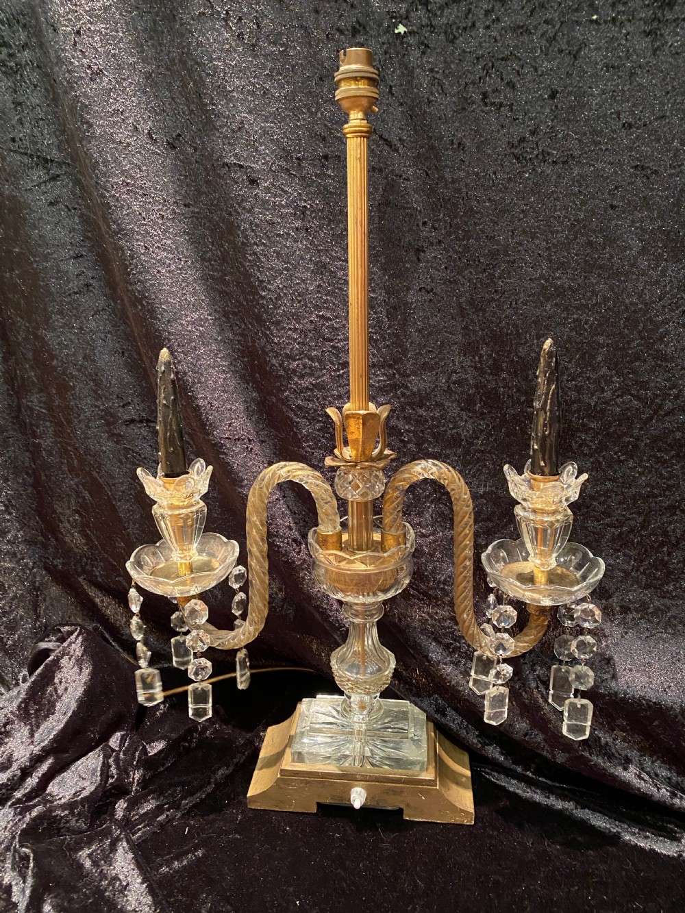 A pair of gilt brass and cut crystal two-arm candelabra table lamps featuring twisted glass arms, cascading crystal droplets, and stepped bases. View III