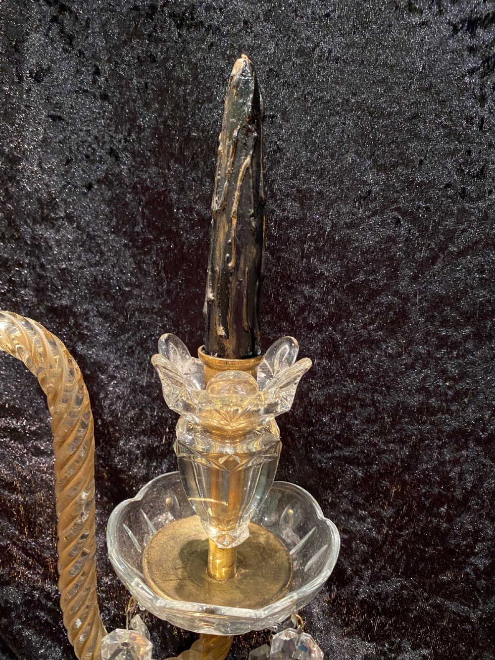 A pair of gilt brass and cut crystal two-arm candelabra table lamps featuring twisted glass arms, cascading crystal droplets, and stepped bases. View VII