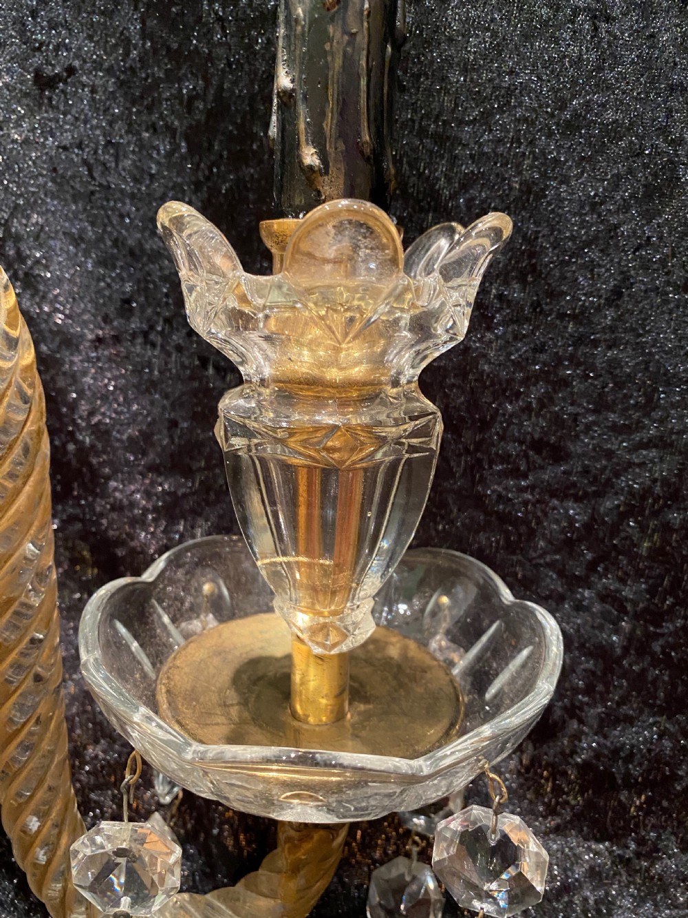 A pair of gilt brass and cut crystal two-arm candelabra table lamps featuring twisted glass arms, cascading crystal droplets, and stepped bases. View VIII