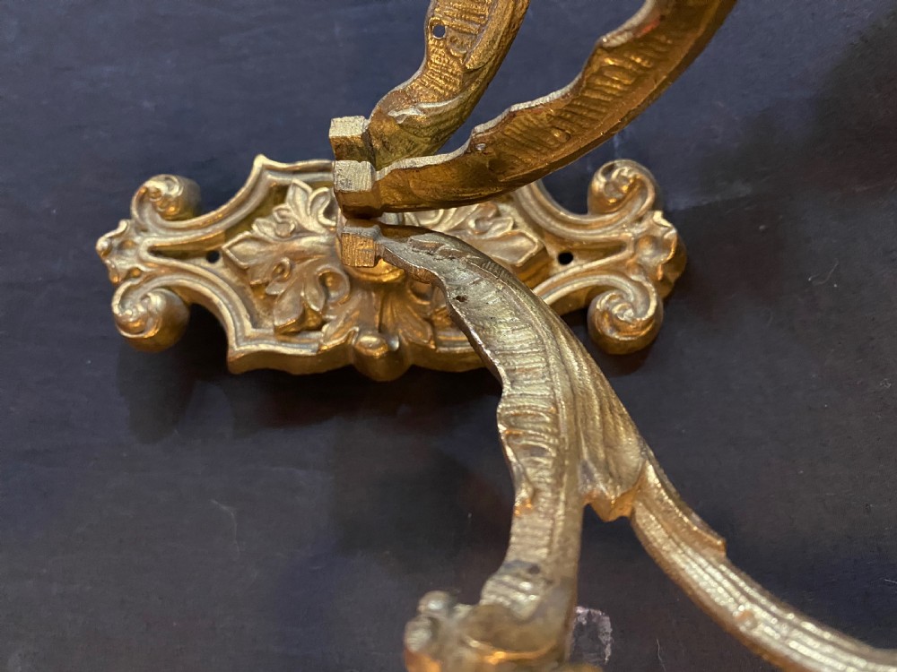 A PAIR OF FIVE ARM BRASS FRENCH WALL-LIGHTS View II