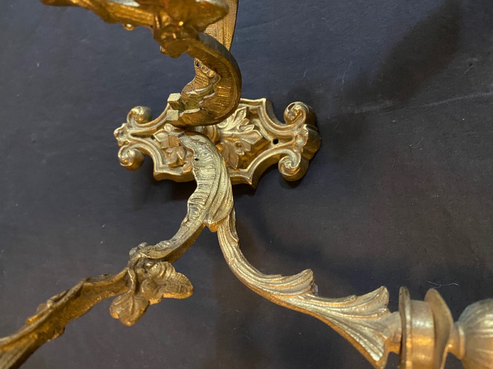 A PAIR OF FIVE ARM BRASS FRENCH WALL-LIGHTS View III