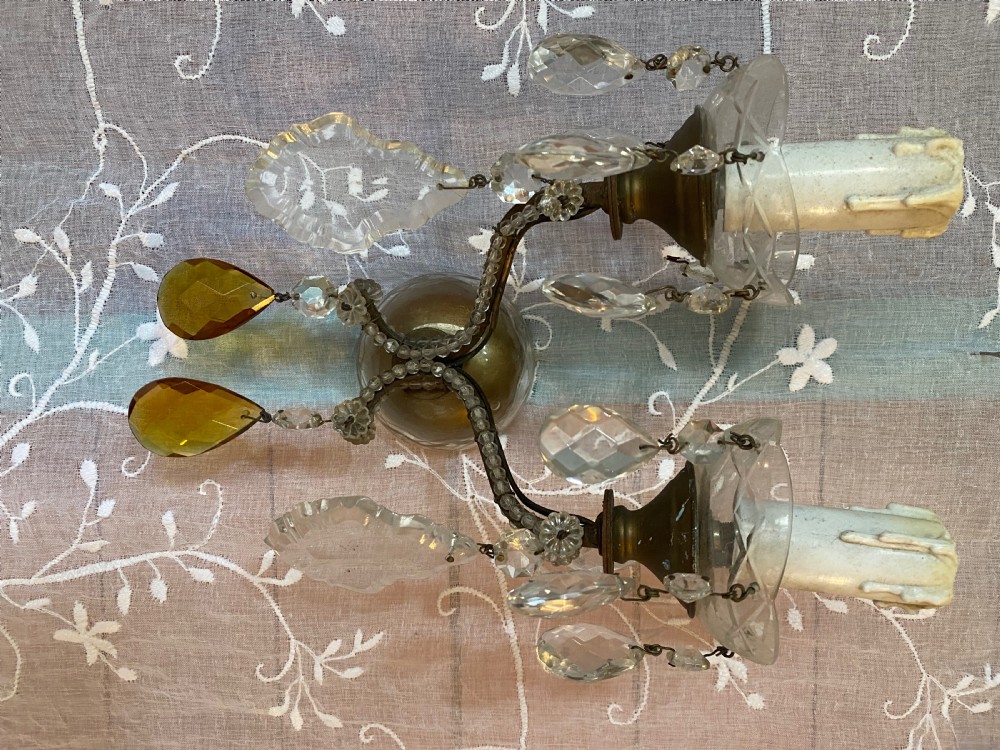 A pair of antique Florentine wall lights featuring twin curved metal arms wrapped in small glass beads, decorated with clear glass droplets, amber crystal prisms, and candle-style lamp holders. View II