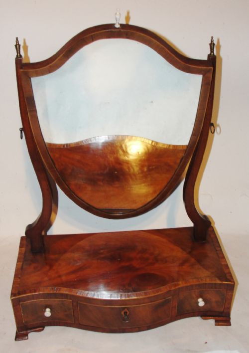 Sheraton Mahogany Serpentine Toilet Mirror. Circa 1790
