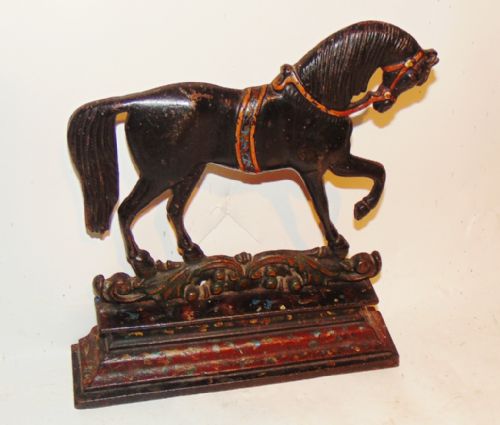 Victorian Cast Iron Door Stop. Ciirca 1860