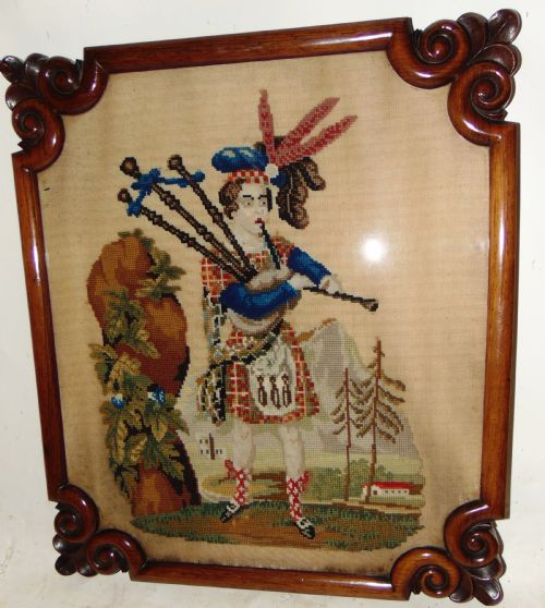 Victorian Needlework Picture of \Piper. Circa 1850
