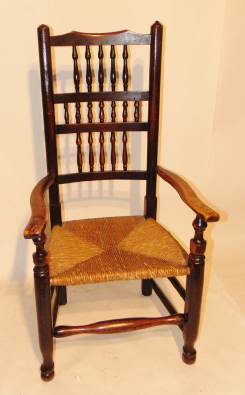 Georgian Elm Spindle Back Elbow Chair. Circa 1800