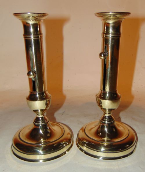 Pair Georgian Brass Ejector Candlesticks. Circa 1820