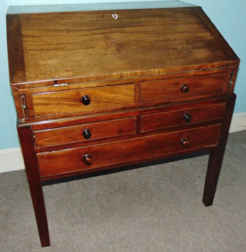 GEORGIAN MAHOGANY BUREAU ON STAND CIRCA 1810