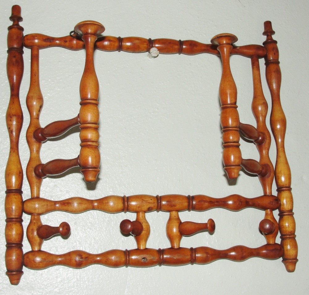 Victorian turned fruitwood hanging hat or wig rack. Circa 1860